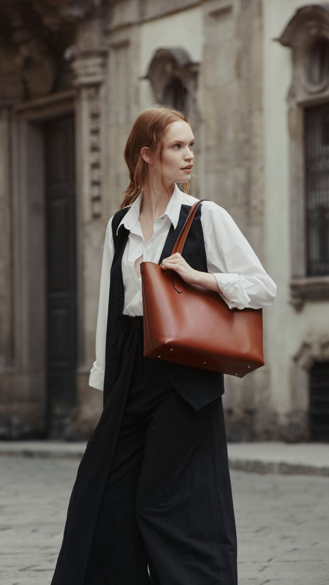 Model in Milan Italy with The MODHER Elba Brown shoulder bag
